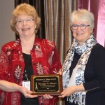 Carolyn Weaver receives the 2015 Hines Award from chair Fran Lennie.
