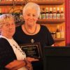 Ina Gravitz receives the 2016 Hines Award <BR>from chair Sandi Schroeder.