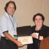 Richard Genova receives the Excellence in Indexing Award, presented by Joan Shapiro at the 2017 ASI Conference.